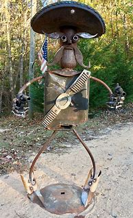 Image result for Junk into Yard Art