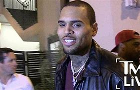Image result for Chris Brown with a Gun
