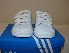 Image result for Orange and Blue Adidas
