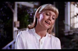 Image result for Hopelessly Devoted to You HTV