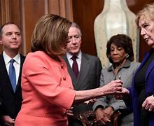 Image result for Nancy Pelosi Hands Out Pens
