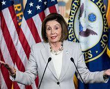 Image result for Picture of Pelosi Standing Up to Trump