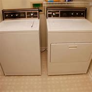 Image result for Red Washer and Dryer Kenmore Set