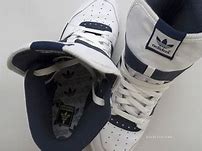 Image result for Purple Adidas High Top Sneakers