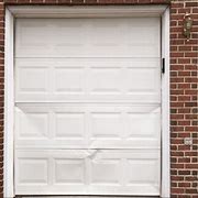 Image result for Metal Garage Door Dent Repair