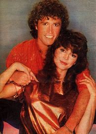Image result for Andy Gibb and Victoria Principal at Key Biscayne National Cheerleaders Contest