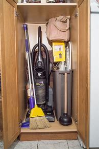 Image result for Broom Closet Cabinet