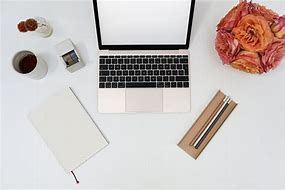 Image result for Flowers On Desk with Laptop