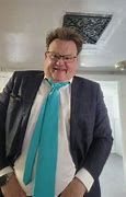 Image result for Chris Farley Dad at Funeral