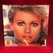 Image result for Olivia Newton-John with Family Happy