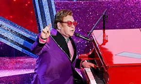 Image result for Elton John Leaves Stage