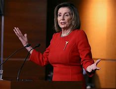 Image result for Picture of Nancy Pelosi Winking