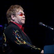 Image result for Elton John 70s Smiling
