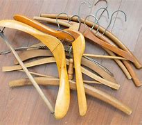 Image result for Cloth Hanger in Leather with Wood