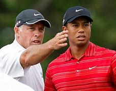 Image result for Tiger Woods caddy for son