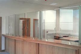 Image result for Reception Desk with Glass Partition