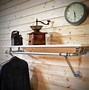 Image result for Wall Mounted Clothes Rack
