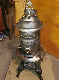 Image result for Brass Parlor Stove