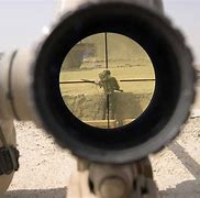 Image result for Man in Sniper Scope