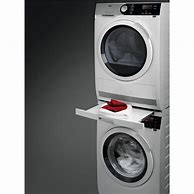 Image result for Catch Button On Whirlpool Stackable Washer Dryer