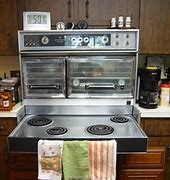 Image result for Frigidaire 4 Piece Kitchen Appliance Package