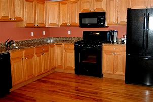 Image result for Kitchen Oak Cabinets Black Appliances