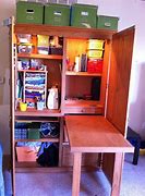 Image result for craft armoire with fold out desk