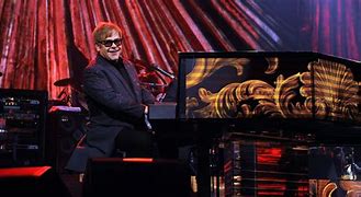 Image result for Elton John at Piano