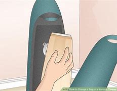 Image result for how to change a bag on a vacuum cleaner
