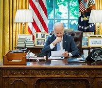 Image result for Joe Biden at Desk