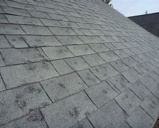 Image result for How Does Hail Damage Roof Shingles