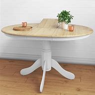 Image result for Round Wood Extending Dining Table
