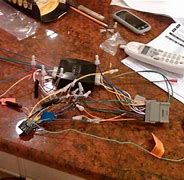 Image result for Metra GMOS-01 Wiring Interface Connect A New Car Stereo And Retain Onstar, Factory Door Chimes, And Audible Safety Warnings In Select GM Vehicles