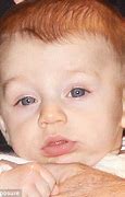 Image result for John Travolta Baby Ben Autism