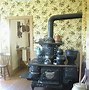 Image result for cast iron wood stove