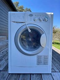 Image result for Red Top Load Whirlpool Cabrio Washer and Dryer Set