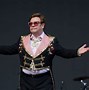 Image result for Elton John Stage Outfits Peacock