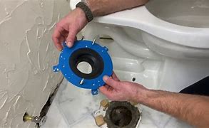 Image result for How to Install a Toilet Tank to Bowl Gasket