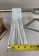 Image result for Space-Saving Hangers for Shirts