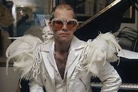 Image result for Elton John White Feather Suit