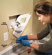 Image result for Fixing Drywall Hole