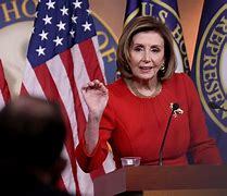 Image result for Nancy Pelosi Speaking with a Mask
