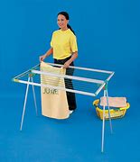 Image result for Folding Wall Clothes Rack Hangers