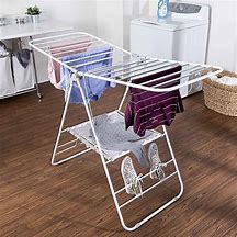 Image result for Clothes Hanger Rack with Drawers