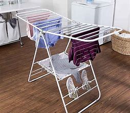 Image result for Wall Clothes Hanger Rack