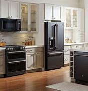 Image result for Cream Kitchen Cabinets with Black Stainless Steel Appliances