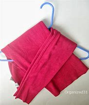 Image result for Folding a Sweater On Hanger