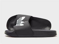 Image result for black adidas adilette slides