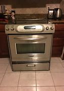 Image result for KitchenAid Stove Top with Red Knobs