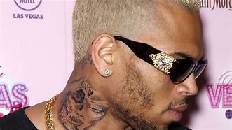 Image result for Chris Brown and Rihanna Wing Tattoos
